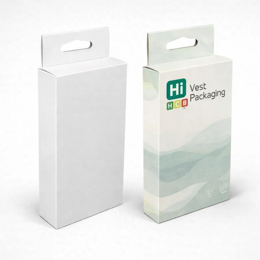 Two slim cardboard boxes featuring a die-cut hanging tab for retail display hooks in shops- class=